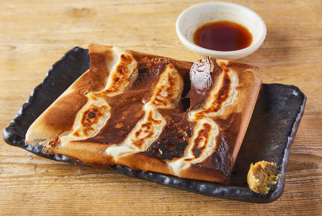 炭火野菜巻き串と餃子 博多うずまき 新潟駅前店